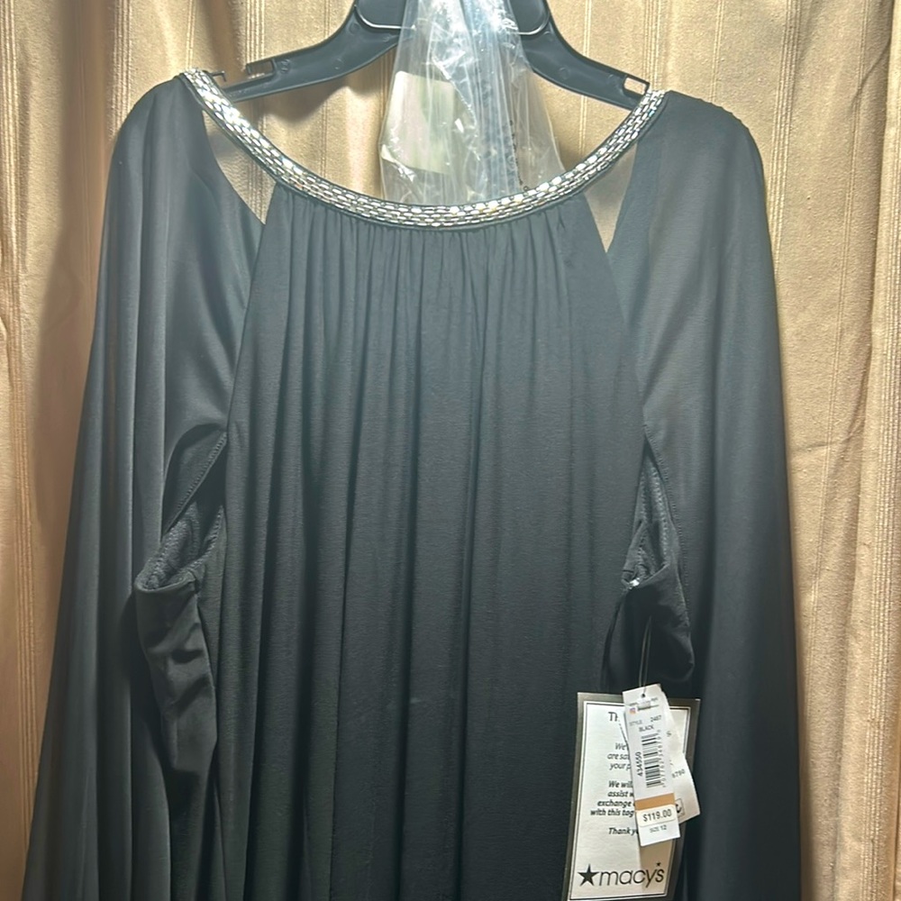 Brand new gown with attached cape , rhinestones
